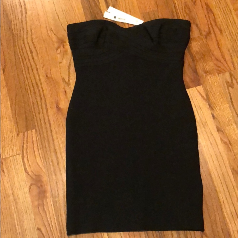 Tight black strapless dress